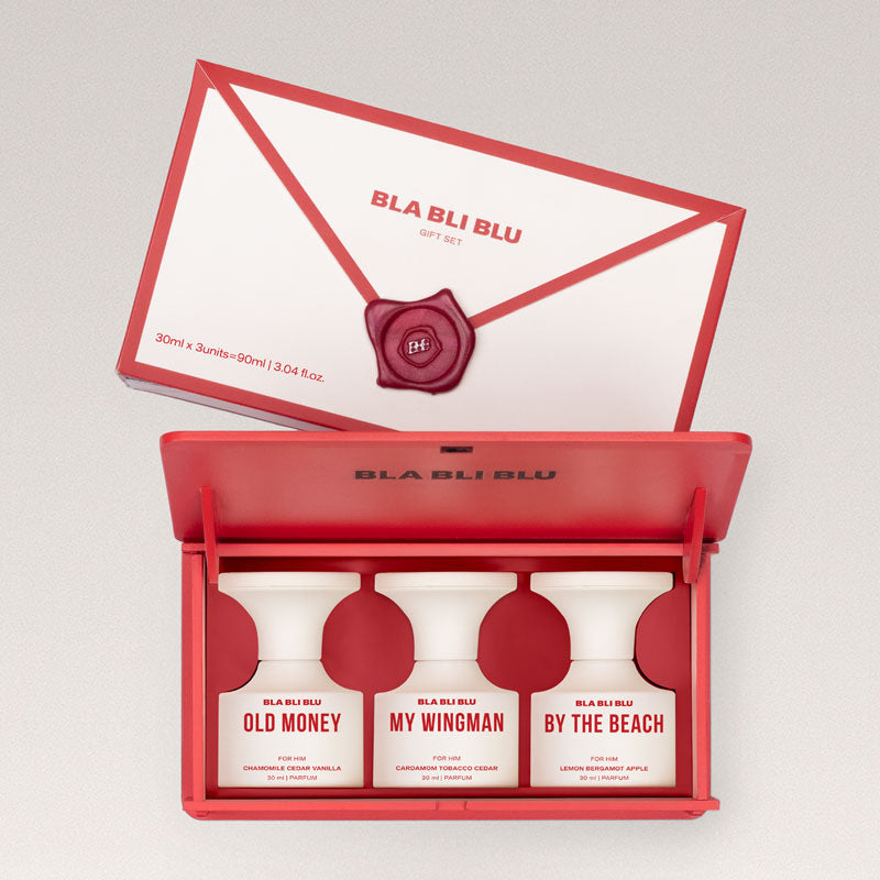 Perfume gift set for men with three bottles on a light gray background