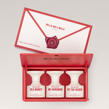 Perfume gift set for men with three bottles on a light gray background