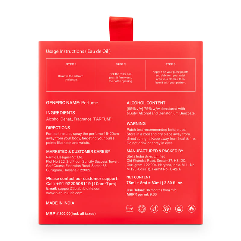 Red perfume bottle packaging with usage instructions and product details .