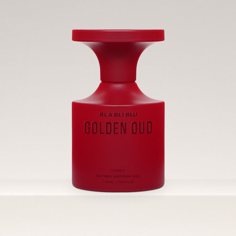 Red perfume bottle labeled 'Golden Oud Perfume' on a white background