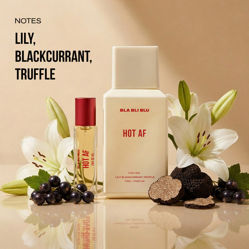 Perfume bottle labeled 'BLA BLU BLU HOT AF' with flowers.