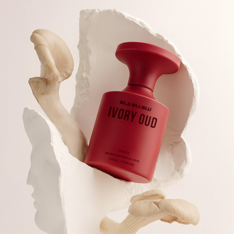 Red Oud perfume bottle labeled 'IVORY OUD' on a white background