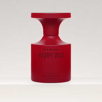 Red Oud perfume bottle labeled 'IVORY OUD' on a white background
