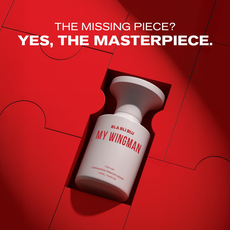 White Best Perfume for men bottle labeled 'My Wingman' on a red background with text about it being a 'masterpiece'.