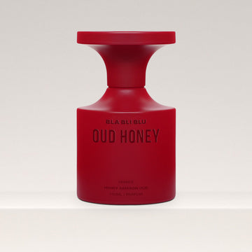 Red honey oud unisex perfume bottle labeled by BLA BLI BLU on a white background