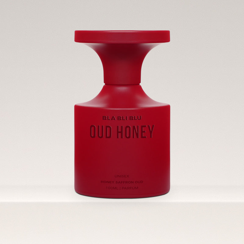 Red honey oud unisex perfume bottle labeled by BLA BLI BLU on a white background